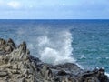 Coastline and rugged lava rocks called DragonÃ¢â¬â¢s Teeth and crashing waves at Makaluapuna Point near Kapalua, Maui, HI, USA Royalty Free Stock Photo